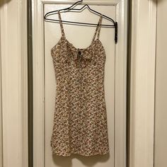 Nwt Zaful Beige Cream Background W/Gold & Blush Red/Pink & Hunter Green Small Flowers Mini Sun Dress Size Medium~ 14” Wide From Armpit To Armpit & 23” Long From Top Of Back Of Dress (Not Straps) To Bottom Hemline (Taken Lying Flat, So Approximate) Zaful Show Medium To Fit A Size 6 Has A Back Zipper, Adjustable Cami Straps & A Tie Keyhole Front Slight A-Line Shaped Skirt From Waist Down Made Of 100% Polyester, Doesn’t Have Much Stretch Super Cute & Feminine! Brown Floral Print Mini Dress For Summer, Cream Floral Print Mini Dress For Vacation, Cream Floral Print Sundress For Day Out, Cream Floral Sundress For Day Out, Beige Cotton Floral Sundress, Fitted Beige Sundress With Floral Print, Fitted Beige Floral Print Sundress, Beige Floral Print Mini Dress, Beige Ditsy Floral Print Beach Dress