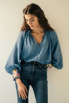 A loosely fitted lightweight cotton voile blouse with delicately embroidered cuffs ,hand-made embroidered buttons. Embroidered Blouse Outfit, Luxury Embroidered Blue Blouse, Blue Embroidered Tunic Blouse, Blue Embroidered Collared Blouse, Blue Embroidered Button-up Blouse, Vintage Blue Embroidered Blouse, Cotton Voile, Embroidered Blouse, Handcrafted Leather