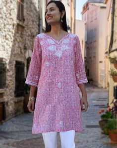 100% Cotton; Light weight and soft Printed tunic, will reach your mid to lower thigh (about 34 inches long); Full sleeves Delicate hand embroidery Average length of tunic : 33 inch Length of product may slightly vary as per the sizes. Please note: smaller size may be slightly shorter and bigger size may be slightly longer in length. All Regular and Plus Sizes available Machine wash cold; Delicate cycle; Use mesh; Line dry; Light Iron Please follow the Ayurvastram Sizing Chart Ayurvastram present Floral Embroidered Straight Kurta Top For Summer, Summer Floral Embroidered Straight Kurta Top, Spring Floral Embroidered Straight Kurta Top, Summer Straight Kurta With Embroidered Hem, V-neck Tunic With Chikankari Embroidery For Spring, Spring Straight Kurta Blouse With Embroidered Neckline, Spring Embroidered Kurta With 3/4 Sleeves, Spring Embroidered Straight Kurta Blouse, Spring Embroidered Neckline Straight Kurta Blouse