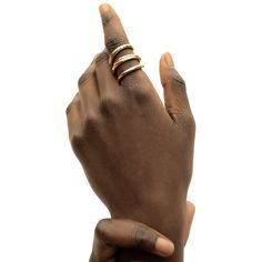 The Amali Open Ring stands out effortlessly with its subtle, soft curves. Perfect to wear solo or with your favorite ring stack. In Swahili, Amali means hope. Handcrafted by artisans in Kenya with 24k gold plated brass using traditional techniques. Maximum thickness: 0.11in (3mm) Minimum thickness: 0.07in (2mm) Height: 1in (25.4mm) Size Chart Open Ring Gold, Stackable Necklaces, Tarnish Remover, Stacked Earrings, Ring Stack, Ring Stand, Handcrafted Rings, Favorite Rings, Wood Jewellery