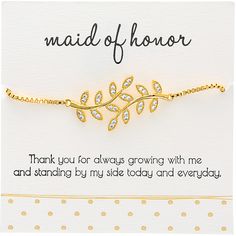 PREMIUM QUALITY: This 18k gold plated brass bracelet has two 4.5" box chain strings with round balls at the end of each side of the 1.5" long x .75" tall leaf free-moving curved pendant. Both chains are connected by a silicone-centered bead, allowing for a one-size-fits-most adjustable setting. Each of the fourteen leaves contains two bezel set 2mm AAA cubic zirconia gems with a total of twenty-eight clear sparkling gems. The flattened, thick black paper gift bag contains a sparkly gold ribbon f Adjustable Gold-plated Bracelet For Formal Occasions, Formal Gold-tone Hallmarked Bracelets, Gold-tone Link Bracelet For Formal Occasions, Formal Gold-plated Link Bracelet, Formal Gold-toned Stainless Steel Link Bracelet, Meaningful Messages, Brass Bracelet, Paper Gift Bags, Gold Ribbons