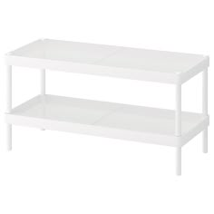 a white shelf with two shelves on each side