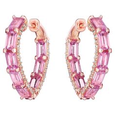 Metal: 18KT Rose Gold Total Carat Weight: 6.93ctw (Earrings are sold as a pair) Number of Pink Sapphires: 16 Carat Weight: 6.30ctw Shape: Baguette Number of Round Diamonds: 116 Carat Weight: 0.63ctw Pink Sapphire Hoop Earrings, Pink Round, American Modern, Diamond Hoop Earrings, Pink Ring, Pink Earrings, Gorgeous Jewelry, Body Jewellery, Rings Jewelry