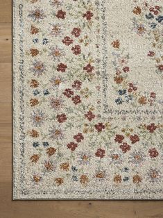 an area rug with flowers on it