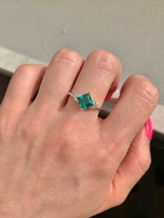 This gorgeous, timeless ring features our favorite stunning emerald design and hand picked crystals. ✦ DETAILS ✦ ✧ Handcrafted ✧ About 2.25 Carat center stone ✧ Natural crystals ✧ Sizes 3.5-11 ✧ Sterling Silver 925 or gold filled ✧ This ring will arrive ready to gift in a Kherish Jewelry Pouch. ✧ PRE-ORDER: Items that are preorder only will ship within 10-15 business days. You will receive an email with the updated processing time if you order a size/option that qualifies for pre-order. ✧ Due to May Birthstone Jewelry With Princess Cut Center Stone, Princess Cut Emerald Jewelry, Classic Princess Cut Emerald Jewelry, May Birthstone Jewelry With Prong Setting In Princess Cut, Cubic Zirconia Princess Cut Jewelry For Proposal, Princess Cut Cubic Zirconia Jewelry For Proposal, Princess Cut Emerald Jewelry In White Gold, White Gold Princess Cut Emerald Jewelry, Green Princess Cut Diamond Jewelry