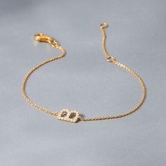 A statement of style, this Blaire Diamond Initial Bracelet will add a touch of sparkle to any look. Showcasing a single shimmering diamond-encrusted initial, this sleek and sophisticated piece of jewelry is sure to turn heads. Available in sterling silver or 14k gold vermeil 6" cable chain with 1" extender Initial size: 3/8" tall, width varies Lobster claw closure 1mm diamonds This is an uppercase only font, lowercase letters entered will be produced as uppercase This item is FINAL SALE SKU: BYB Elegant Sterling Silver Diamond Bracelet For Party, Elegant Sterling Silver Name Bracelet With Initials, Elegant Sterling Silver Initials Name Bracelet, Luxury Diamond Name Bracelet For Anniversary, Silver Diamond Name Bracelet For Anniversary, Elegant Chain Bracelet With Pave Setting As Gift, Personalized Silver Diamond Bracelet, Elegant Pave Setting Chain Bracelet For Gift, Elegant White Gold Bracelet With Initials