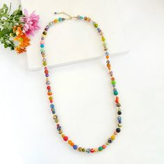 Kantha Sonnet Necklace - Mango + Main Festive Spiritual Beaded Necklaces With Colorful Beads, Festive Spiritual Beaded Necklace With Colorful Beads, Multicolor Fair Trade Festive Jewelry, Festive Bohemian Beaded Necklaces With Tiny Beads, Festive Bohemian Beaded Necklace With Tiny Beads, Adjustable Beaded Chain Beads For Festive Occasions, Adjustable Beaded Chain For Festive Occasions, Adjustable Beaded Chain Necklaces For Festive Occasions, Adjustable Beaded Necklaces For Festive Occasions