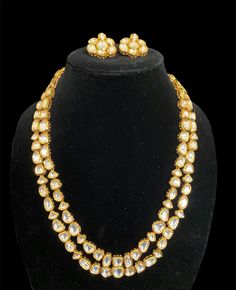 Premium quality kundan necklace set with stunning studs. The necklace is adjustable to your desired length. Perfect for both, everyday wear or special occasions. The set is beautifully designed to complement any outfit, adding a touch of elegance and sophistication to your look.  The necklace set makes for an ideal gift for yourself or a loved one. Gold Bollywood Jewelry With Dori Work, Festive Gold Kundan Necklace With Dori Work, Kundan Necklace With Meenakari For Party, Gold Kundan Necklace With Dori Work In Bollywood Style, Gold Kundan Necklace With Dori Work For Diwali, Kundan Necklace With Dori Work As A Gift, Kundan Necklace With Dori Work For Gift, Elegant Gold Kundan Necklace With Dori Work, Elegant Kundan Necklace With Dori Work For Festive Occasions