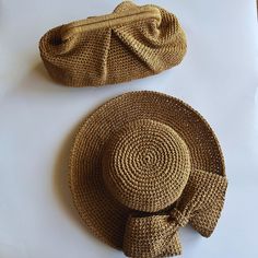 👒Meet our stunning Handmade Crochet Raffia Hat and Clutch bag that will be the perfect addition to your summer wardrobe! 👒Get ready for summer with this stylish Handmade Raffia Clutch and Luxury Floppy Straw Hat set - the perfect Mother's Day and Easter gifts! The Boho Natural Bag adds a touch of elegance to any outfit, while the Camel Pouch is versatile and convenient for daily use. Whether you're headed to the beach or out for a sunny stroll, this Beach Woven Sun Hat will keep you shaded in Bohemian Beige Woven Hat, Bohemian Jute Sun Hat For Vacation, Bohemian Beige Crochet Hat For Beach, Beige Bohemian Crochet Hat For Beach, Bohemian Beige Crochet Beach Hat, Beige Bohemian Crochet Beach Hat, Beach Bohemian Beige Crochet Hat, Bohemian Crochet Straw Hat For Beach Season, Bohemian Jute Straw Hat For Beach Season