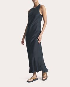 Rooted in pared-back luxury, the Valencia slip dress tailors its silk silhouette with bias-cut seams to glide effortlessly down your figure. The high neckline exudes sophisticated appeal. Back hook-and-eye closure Bias-cut seams 100% silk Dry clean only Made in China Size & Fit Garment measurements (size S): 51.38in long from high point of shoulder to hem, 38.58in bust, 37.01in waist, 41.34in hips Model (wearing size S): 5ft 8in tall Fits true to size Size XS = US 2-4 / UK 6-8 Size S = US 4-6 / Silk Charmeuse, Organic Materials, High Point, High Neckline, Dry Clean Only, Valencia, Slip Dress, Read More, Black Dress