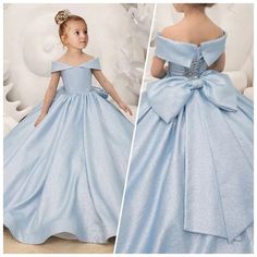 Make every moment magical with our Off Shoulder Long Flower Girl Dress! Designed for elegance and enchantment, this princess satin ball gown is perfect for your little one's special occasions, from birthday parties to her first communion. This exquisite dress features a charming off-shoulder design adorned with a graceful bow, giving it a timeless look that's both elegant and playful. Crafted from premium satin, the dress flows beautifully into a full ball gown silhouette, making every twirl mem Princess Style Satin Ball Gown, Light Blue Ball Gown Princess Dress For Parties, Satin Princess Dress For Dress-up, Light Blue Princess Gown For Dress-up, Princess Style Light Blue Ball Gown, Light Blue Princess Ball Gown, Light Blue Princess Style Ball Gown, Princess Style Satin Dress With Fitted Bodice, Blue Princess Dress With Fitted Bodice