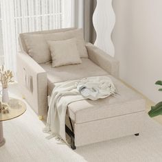 a living room with a white couch and coffee table