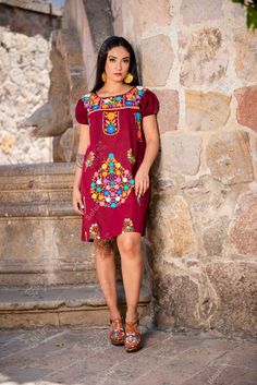 This Beautiful Floral embroidered Dress is the perfect dress to add to your wardrobe. -Its cute enough to dress up for a party or even just wear it to a picnic. -It's lightweight, handmade and hand embroidered by Mexican Artisans in Puebla, Mexico. Red Dresses With Embroidered Sleeves, Multicolor Floral Embroidered Knee-length Dress, Short Sleeve Cotton Dress With Multicolor Embroidery, Cotton Knee-length Dress With Embroidered Hem, Knee-length Cotton Dress With Embroidered Hem, Short Sleeve Cotton Dress With Geometric Embroidery, Embroidered Knee-length Mini Dress, Fitted Cotton Dress With Geometric Embroidery, Knee-length Multicolor Floral Embroidery Dress