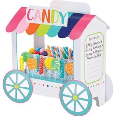 a candy cart with lots of candies and lollipops on the front