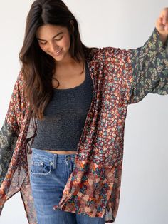 The wide sleeves and oversized fit! Brighten up any outfit with the mixed prints! Oversized Hippie Tops For Fall, Casual Patchwork Kimono For Fall, Oversized Printed Multicolor Tops, Oversized Printed Spring Outerwear, Casual Tops With Kimono Sleeves For Fall, Bohemian Patterned Tops For Fall, Casual Fall Tops With Kimono Sleeves, Oversized Printed Outerwear For Spring, Printed Oversized Outerwear For Spring