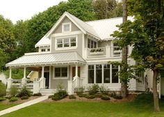 a large white house with lots of windows