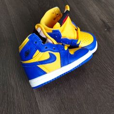 Brand New No Original Box Size 2c Or 4c Toddler Baby (Please Choose Correct Size) Brand Nike Air Jordan Model Air Jordan 1 Reverse Laney Style # Fd2598-700 Colorway Blue Yellow / White Soles Sporty Jordan Shoes With Round Toe For Playtime, Playful High-top Sneakers With Soft Sole, Sporty Jordan Shoes For Playtime, Yellow Custom Sneakers With Round Toe, Playful Yellow Sneakers With Round Toe, Yellow Casual Sneakers For Training, Blue Custom Sneakers For Training, Blue Round Toe High-top Sneakers For Training, Casual Yellow Sneakers For Training