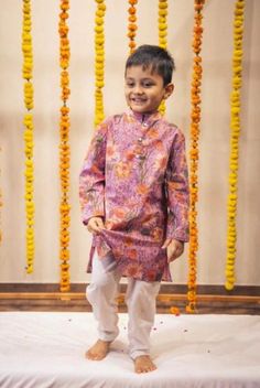 Introduce your young one to the timeless elegance of traditional wear with our Cotton Kurta Set for Boys. Crafted from high-quality, breathable cotton fabric, this kurta set ensures comfort throughout the day, making it perfect for festive occasions, family gatherings, and cultural events. Features: Fabric: 100% Pure Cotton Design: Classic straight-cut kurta with print detailing Fit: Regular fit for easy movement Sleeves: Full sleeves Neckline: Mandarin collar for a traditional touch with metal Printed Cotton Traditional Wear For Diwali, Traditional Printed Wear For Diwali, Traditional Printed Festive Wear, Pink Cotton Salwar Kameez With Kalamkari Print, Cotton Sherwani With Traditional Patterns, Block Print Sets For Puja And Eid, Transitional Kalamkari Print Sets For Puja, Cotton Printed Kurta For Festivals, Traditional Printed Kurta For Transitional Season