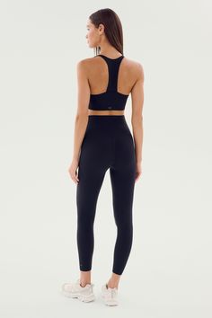 An all new extra waist version of our high waist Airweight legging engineered to fit every curve and flow with your workouts. Our ultra luxe Airweight fabric has a supremely soft hand and second skin comfort. BEST FOR: hot yoga, barre, Pilates.Model Stats:Height: 5’10”, Bust: 32", Waist: 23.5”, Hips: 34.5” Wearing size: Small Black Versatile Activewear In Elastane, Versatile Black Elastane Activewear, Black Activewear With Medium Support, Black Minimal Stretch Activewear For Training, Black Medium Support Elastane Activewear, Black Activewear For Pilates With Medium Support, Compressive Full Length Functional Activewear, Sleek Elastane Activewear For Pilates, Seamless Black Leggings For Sports