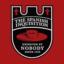 a red t - shirt with the spanish inquisition logo