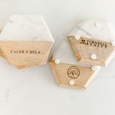 marble and wood coasters with the names caler & mila written on them