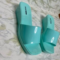 Women’s Fashion Nova Mint Green Flat-Form Sandals Size 10 Chunky Wedge Heel Excellent Condition Nwot Closed Toe Platform Jelly Sandals For Summer, Summer Slip-on Synthetic Wedge Sandals, Trendy Closed Toe Jelly Sandals For Summer, Closed Toe Plastic Sandals, Summer Closed Toe Jelly Sandals, Open Toe Platform Sandals In Plastic, Summer Flat Platform Jelly Sandals, Summer Eva Wedge Sandals For Vacation, Summer Wedge Sandals For Beach Season, Eva Material