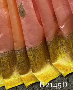 Product Detail: Design Details: Banarasi Semi Georgette saree With Blouse Piece.  Size & Fit: Length: 5.5 meters plus 0.8 Meter blouse piece Width: 1.06 meters (approx) Saree Weight : 0.650 gms Material and care: Saree Type : Banarasi Saree Fabric: Semi Georgette Blouse Fabric: Semi Georgette Blouse Type: (Without Stitch and Stitch) Dry-clean first time there after machine wash or hand wash. Shipping:- We ship goods worldwide within 1 to 3 business days of order confirmation and delivery time is 6 to 8 days. In case of sewing the blouse, you will have to wait 3 more working days. Occasion: Party Wear, Formal Wear, Festival Wear , Marrige Function Wear, Casual Wear, Regular Use.  Note: Disclaimer : The color of actual product may vary slightly from the images provided due to photographic li Pink Tissue Silk Pre-draped Saree With Self Design, Pink Tissue Silk Saree For Eid, Pink Tissue Silk Traditional Wear With Pallu, Pink Katan Silk Pre-draped Saree For Festivals, Pink Chanderi Saree For Wedding, Pink Tissue Silk Saree For Festivals, Pink Self-design Pre-draped Saree For Eid, Pink Tissue Silk Dupatta With Pallu Detail, Pink Tissue Silk Dupatta With Pallu