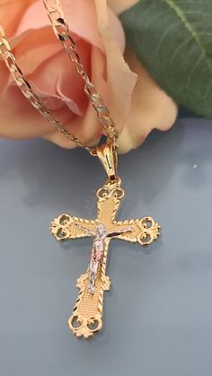 "14k Gold Plated Crucifix Pendant with Necklace *Pendant Height: 2.25\" inches Approx. *Pendant Width: 1.\" inch *14k Gold Plated *Includes 23.5\" inches Cuban chain) Material: Copper Measurements: Chain - 12 inch. from top to bottom (24\" Long from end to end) *ABOUT US* \"Ashley Accesorios\" is an online retailer based in Lacey, Wa. Our goal is to provide the BEST QUALITY items at AFFORDABLE PRICE to our customers with FAST SHIPPING. *SHIPPING & HANDLING*Enjoy fast shipping! All orders are St Jude Necklace, Crucifix Necklace, Religious Cross, Plate Necklace, Eye Bracelet, Evil Eye Bracelet, Cuban Chain, Online Retail, Cute Jewelry