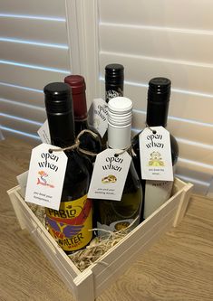 a wooden box filled with bottles of wine