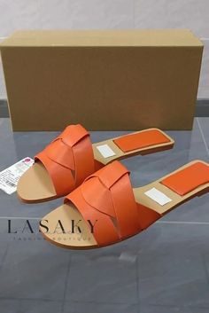 Lasaky - Versatile Coastal Slip-On Sandals for Effortlessly Chic Flat Sole Comfort. Orange Synthetic Flat Heel Sandals, Open Toe Orange Slippers For Beach, Flat Heel Orange Sandals For Summer, Orange Flat Heel Sandals For Summer, Orange Open Toe Slippers For Beach, Orange Open Toe Slippers For The Beach, Orange Closed Toe Mules For Summer, Orange Flat Slippers For Spring, Orange Round Toe Slippers For Spring