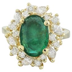 4.67 Carat Natural Emerald 14 Karat Solid Yellow Gold Diamond Ring Stamped: 14K Total Ring Weight: 8.1 Grams Emerald Weight 3.57 Carat (12.00x10.00 Millimeters) Diamond Weight: 1.10 carat (F-G Color, VS2-SI1 Clarity ) Face Measures: 19.15x18.00 Millimeter SKU: [600862] Luxury Cluster Emerald Ring In Yellow Gold, Luxury Yellow Gold Cluster Emerald Ring, Gia Certified Yellow Gold Cluster Ring, Gia Certified Gold Cluster Jewelry, Gia Certified Marquise Yellow Gold Jewelry, Cluster Emerald Ring In Yellow Gold With 17 Jewels, Yellow Gold Cluster Emerald Ring Fine Jewelry, Cluster Emerald Jewelry In Yellow Gold, Formal Yellow Gold Cluster Ring With Emerald