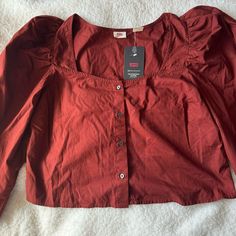 Brand New With Tag! Beautiful Blouse, Brick Like Color (Color In Pictures Is Not Exact) Levi's Casual Long Sleeve Blouse, Red Long Sleeve Daywear Top, Red Long Sleeve Top For Daywear, Levi's Tops For Workwear In Fall, Levi's Workwear Top For Fall, Red Button-up Top For Daywear, Levi's Button-up Tops For Fall, Levi's Fall Blouse, Levi's Shirt For Spring