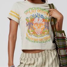 The Offspring Tee With A Psychedelic Graphic Printed At The Front. Hits At The Waist And Slim-Fitting Throughout With A Crew Neckline. Complete With Striped Detailing At The Sleeves. Urban Outfitters Exclusive. Features - The Offspring Graphic Tee - Striped Sleeves - Slim-Fit - Uo Exclusive Content + Care - 100% Cotton - Machine Wash - Imported Size + Fit Women’s Size Large Spring Festival Casual T-shirt, Retro Cotton T-shirt For Spring, Spring Festival Hippie T-shirt, Fitted Vintage Print T-shirt For Spring, Casual Letter Print Top For Music Festival, Retro Graphic Print T-shirt For Spring, Trendy Graphic Print Tops For Music Festival, Casual Screen Print Tops For Music Festival, Casual Tops With Screen Print For Music Festival