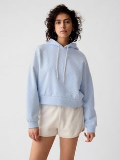 Soft cotton-blend sweatshirt.  Hooded neckline with drawcords.  Long sleeves with banded cuffs.  Gap logo allover.  Straight silhouette with a relaxed, cropped fit.  Hits at the waist.  Models wearing Gap Hoodie Gap, Gap Logo, Vintage Soft, Blue Print, New Woman, Toddler Boys, Gap, Light Blue