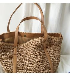 In Stock Fast Shipping From Los Angeles This exquisite large straw woven tote bag features leather accents, making it suitable for any type of occasion. Size: 46cm wide x 30cm tall (18in x 12in) Magnetic button closure Designer Style ID: 8131 Large Straw Woven Tote Bag with Leather Accents, Summer Bag, Everyday Shoulder Bag, Beach Bag Casual Straw Bags With Leather Handles, Casual Beige Straw Bag With Leather Handles, Casual Brown Straw Tote Bag, Casual Light Brown Bucket Bag With Braided Handles, Casual Style Large Capacity Natural Fiber Shoulder Bag, Summer Bag In Light Brown With Braided Handles, Casual Straw Shoulder Bag With Leather Handles, Light Brown Beach Bag With Leather Handles, Woven Light Brown Bags For Vacation