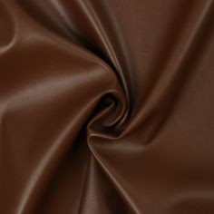 a close up view of a brown leather textured material that is very soft and smooth