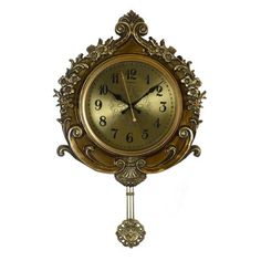 an ornate gold clock on a white background