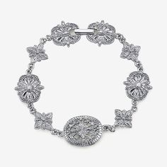 Wrap your wrist in elevated elegance with this silver-tone filigree vintage-inspired clasp bracelet. With a hidden fold-over clasp, this bracelet is quite the fashionable find.Circumference: 7 1/2 InchJewelry Closure: Fold Over ClaspMetal Color: Silver ToneChain Length: 7 3/4 InchCare: Wipe CleanBracelet Type: Link BraceletsMetal: AlloyIs Beaded: NoCountry of Origin: Imported Elegant Metal Chain Bracelet With Intricate Design, Silver Bracelet With Butterfly Clasp, Elegant Silver Bracelet With Butterfly Clasp, Classic Metal Bracelet With Intricate Design, Classic Metal Bracelets With Intricate Design, Elegant Antique Silver Bracelets For Formal Occasions, Classic Sterling Silver Bracelet With Filigree, Elegant Adjustable Bracelet With Butterfly Clasp, Elegant Metal Bracelet With Filigree Details