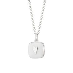 Embrace the enduring beauty of this sterling silver locket necklace. Crafted with high-quality materials, it features a classic heart shape highlighted by crisp white enamel. This piece is more than just an ornament; it's a cherished keeper of your most treasured memories. Open the locket to hold tiny photographs close to your heart, adding a touch of sentimental value to your everyday style.  All Lily Charmed jewellery comes presented in a beautiful gift box hand tied with ribbon. Material: 100 Sterling Silver Locket Necklace, Silver Locket Necklace, Sterling Silver Locket, Silver Locket, Heart Locket Necklace, Box Hand, Silver Lockets, Heart Locket, White Heart