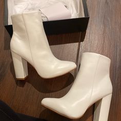 All White Brand New Never Worn Size 7 White Comes With Box Pleather White Heels Boots, White Round Toe Booties For Party, White Round Toe Party Booties, Chic White Closed Toe Heeled Boots, White Faux Leather Square Toe Heeled Boots, White Faux Leather Heeled Boots With Square Toe, Trendy White Square Toe Heeled Boots, Trendy White Faux Leather Heeled Boots, White Booties With Stacked Block Heel