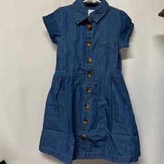 Girls Blue Denim Dress Brand New Size 6x Fully Button Down Lightweight And Super Cute Approx 26” In Length Denim Blue Cotton Dresses With Buttoned Pockets, Blue Cotton Denim Dress With Buttoned Pockets, Button-up Denim Blue Cotton Dress, Denim Blue Cotton Button-up Dress, Blue Cotton Denim Dress With Buttons, Button-up Cotton Denim Dress, Medium Wash Cotton Dress With Buttoned Pockets, Cotton Button-up Denim Dress With Snap Buttons, Casual Cotton Denim Dress With Buttons