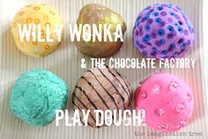 four different colored donuts sitting on top of a white plate with words that read, willy & the chocolate factory play dough