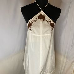 Free People Embroidered Pockets Halter Sun Dress Size L Nwot White Cotton Boho Sundress, Bohemian Cotton Mini Dress With Lace Trim, Beach Boho Cotton Dress Embroidered, Spring Beach Embroidered Dress With Lace Trim, Embroidered Cotton Mini Dress For Vacation, Spring Embroidered Dress With Lace Trim For Beach, Beach Embroidered Cotton Boho Dress, Bohemian Embroidered Cotton Dress With Lace Trim, Bohemian Cotton Embroidered Dress With Lace Trim