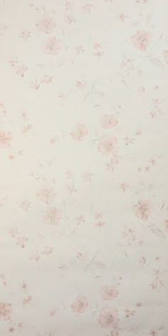 a white and pink flowered wallpaper with small flowers on the bottom half of it