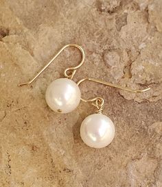 Cute dangly single white pearl earrings Single Pearl Earrings, White Pearl Earrings, Single Pearl, White Pearl Earring, White Pearl, Pearl White, Work Outfit, Work Wear, Pearl Earrings