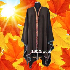 This eye catching embellished with hand work trim reversible cape is elegantly stylish,
The cape can be easily turned around because both sides are beautifully finished,
This Soft and warm Ruana, is a free-flowing wrap with an open front, similar to a large scarf. You can wear as a poncho long in front open, like a shawl, or throw one or both sides over your shoulder(s) for a more romantic or dramatic cape. Traditional Brown Cape For Fall, Traditional Brown Shawl For Fall, Bohemian Alpaca Wrap For Fall, Bohemian Brown Pashmina Shawl For Fall, Alpaca Shawl Cape For Fall, Fall Alpaca Shawl Cape, Traditional One Size Cape For Fall, Traditional One-size Cape For Fall, Traditional Shawl For Fall, One Size