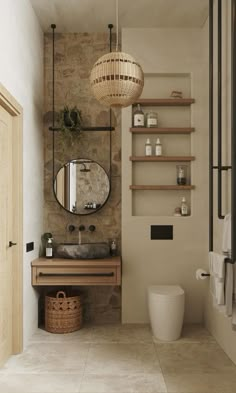 a bathroom with a sink, mirror and toilet in it's centerpieces