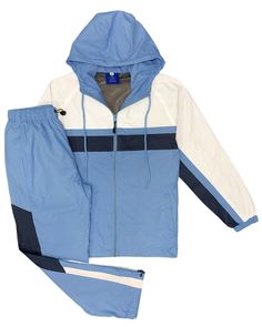 The Ridge windbreaker tracksuit is featured in a three tone color combination as a matching 2-piece outfit. The soft mesh lining absorbs sweat, making this outfit suitable for the GYM, on the sports field or just casual evening walks. Matching outfits have always been in the fashion senses and this fashion design tracksuit compliments current trends in a classy look. About this item1.Full zip up windbreaker Track Jacket with a soft mesh lining and an attached hood with adjustable drawstrings2.Tr Blue Athleisure Track Jacket With Color Block, Windbreaker Tracksuit, Sports Field, Zip Up Windbreaker, Evening Walk, Casual Evening, Current Trends, How To Look Classy, Track Jacket