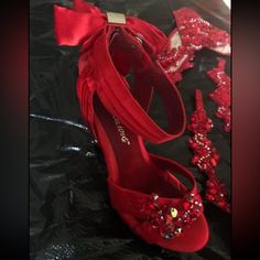 Red Satin Heels Embellished. Worn Only Once For A Few Hours. Size 7 Like Brand New. Zips Up In Back Of Heel. Paid $76 Not Including Tax & Shipping. Elegant Red Embellished Heels, Elegant Embellished Red Heels, Red Fitted Heels With Rhinestones, Red Fitted Rhinestone Heels, Fitted Red Heels With Rhinestones, Red Rhinestone Heels For Prom, Red Rhinestones Heels, Red Satin Heels, Satin Heels