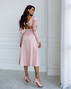 Fabric: Heavy Satin Cotton 50%, Polyester 50% V-neck dress Puffed sleeves Long sleeves Bow on back detail Zipper on back Dress lenght: 125 cm/ 49,2 inSleeve length: 68 cm/ 26,7 in Colors: White, Sky-Blue, Dusty Pink V-neck Dress With Elastic Sleeves For Brunch, Chic Knee-length V-neck Dress With Gathered Sleeves, Chic V-neck Dress With Elastic Sleeves, Chic V-neck Long Sleeve Dress With Gathered Sleeves, Elegant V-neck Midi Dress With Elastic Sleeves, Party Dresses With Structured Shoulders And Bishop Sleeve, Brunch Dresses With Lantern Gathered Sleeves, Feminine Lantern Sleeve Dresses For Brunch, Lantern Sleeve Dress With Gathered Sleeves For Brunch